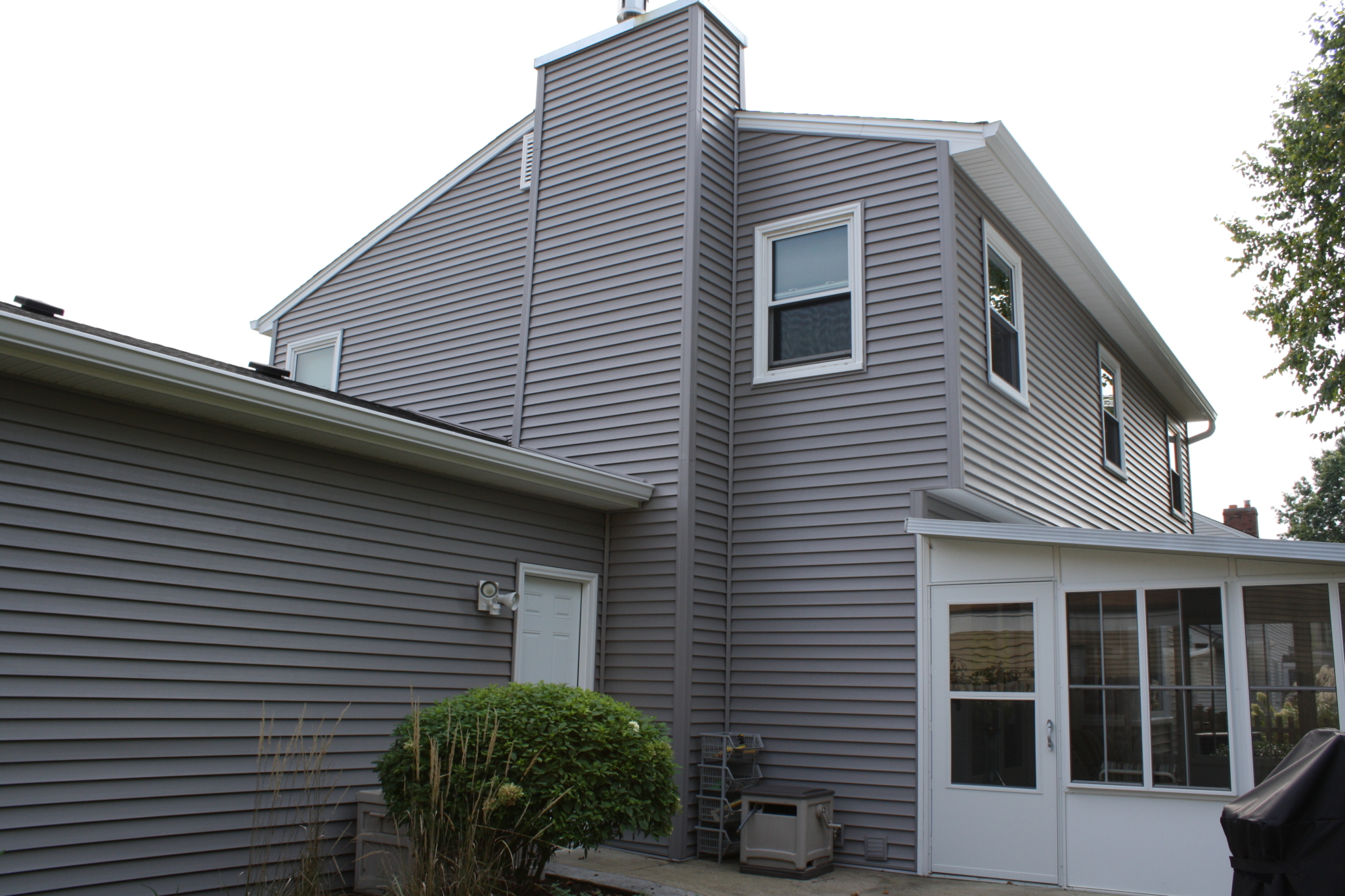 gray-toned vinyl siding on exterior of family home